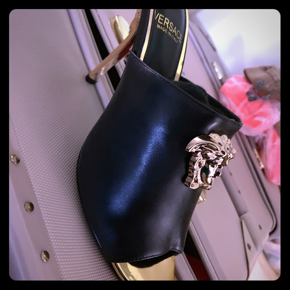 Pair of Black n gold heels never worn